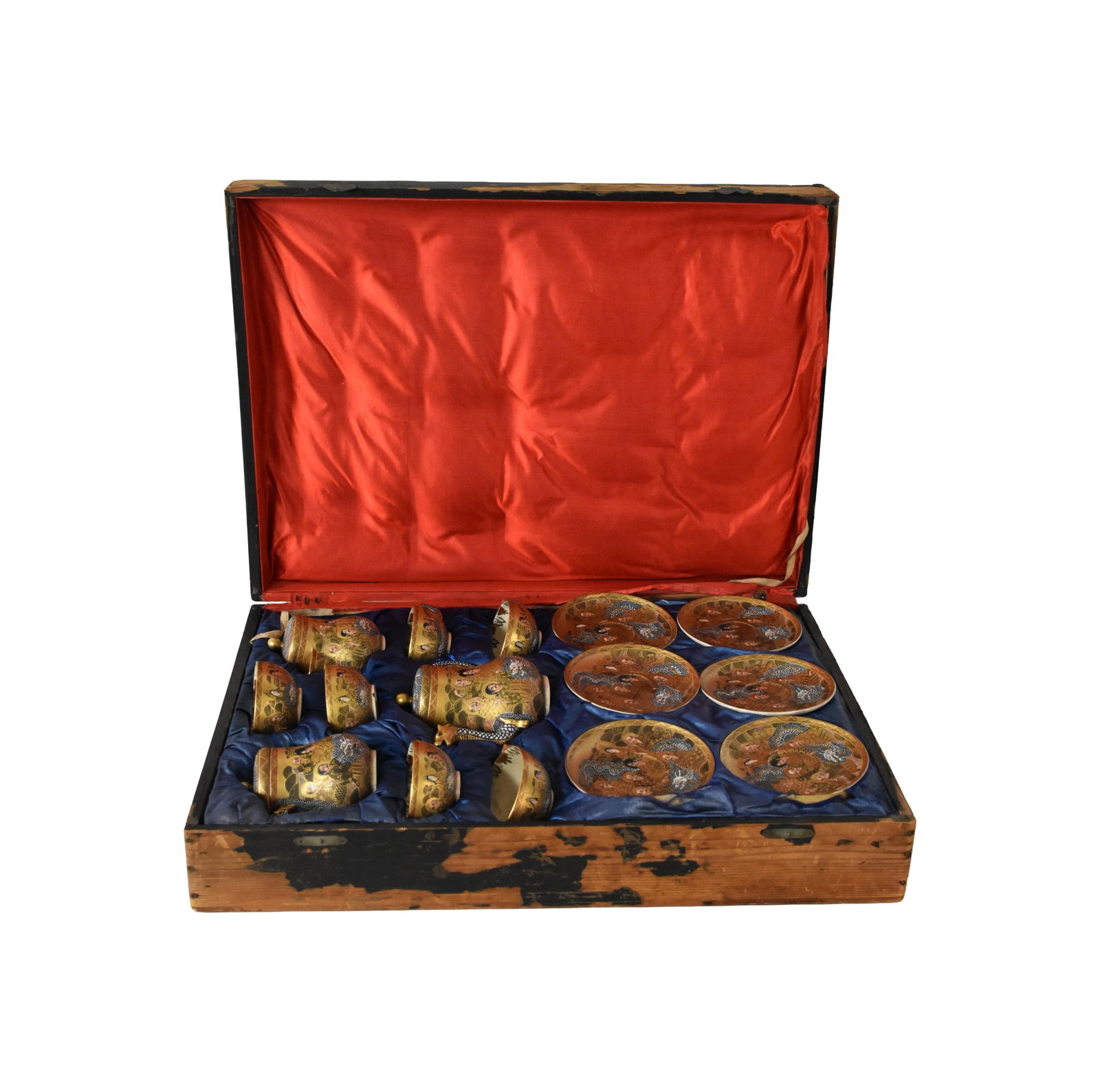(15) Piece Satsuma War Lord Tea Set: Late 19th C. Meiji period. Dragonware. Depicts Buddhist immortals. To include: (A) Six cups and saucers. Cups: 2" high x 3 1/2" diameter. Saucers: 5 1/2" diameter. (B) Teapot. 6" high x 7 1/2" wide x