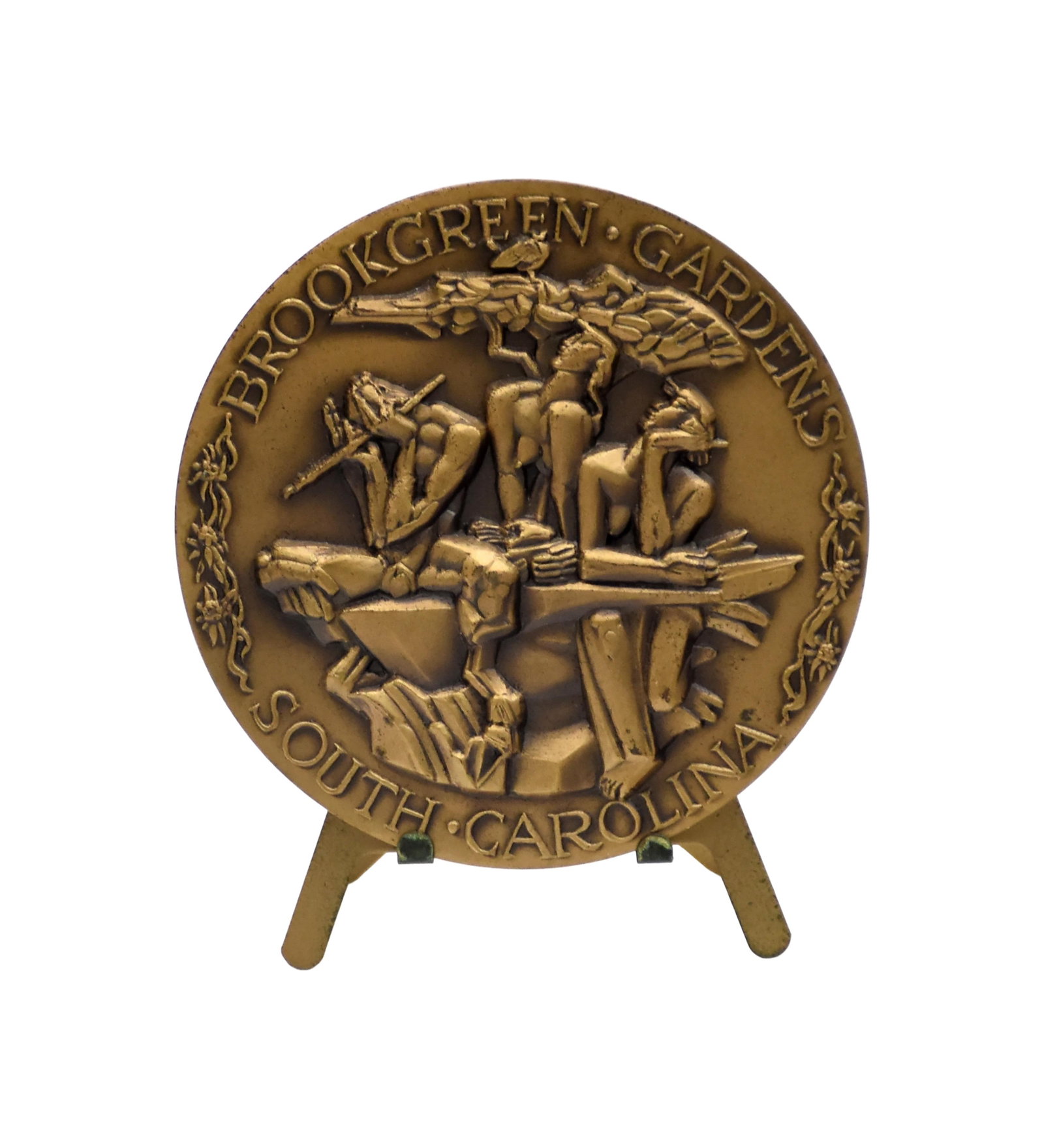 Albert Wein Bronze Medal: (American, 1915-1991). Brookgreen Gardens, South Carolina. Recto: Three nude figures, with the male playing a flute. Verso: Depicts a sculptor at work on a nude female statue. Comes with a custom