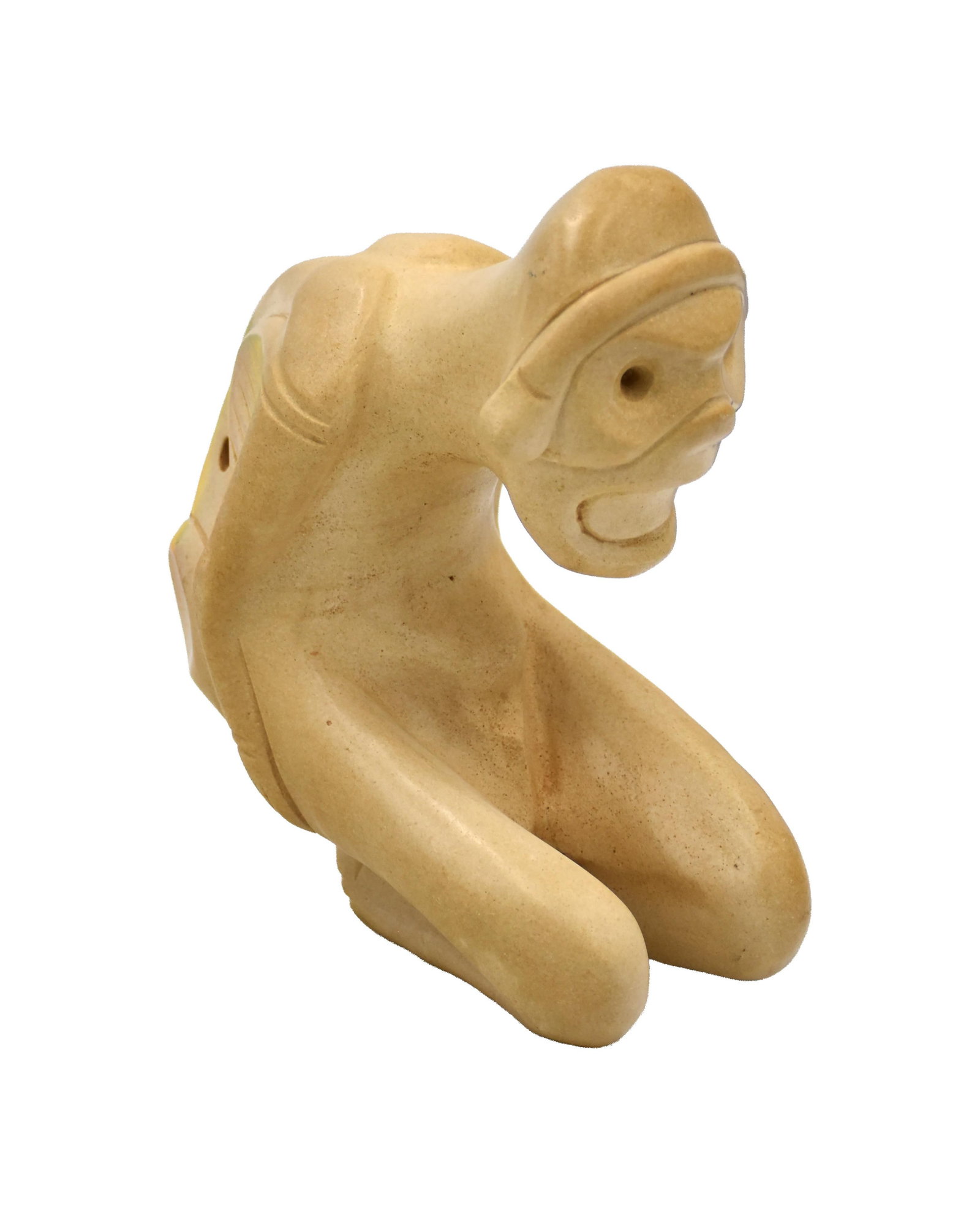 Taino Sculpture: Ca. 600-1500 AD. Fine-grained, heavy jasper-like stone. 6 3/4" high x 3" wide x 6" deep. The body is bent, hands rest on the buttocks, and the feet are uncomfortably curling in a backward position,