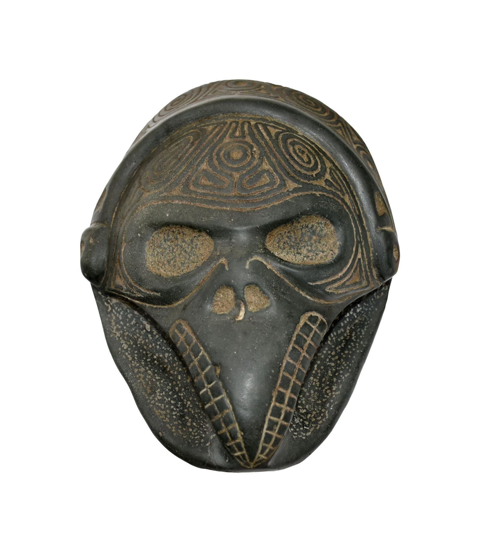 Taino Transitional Head: Ca. 600-1500 AD. Fine-grained greenstone. 8" long x 6 1/4" wide x 2 3/4" high. The form is part human and part snake/bird. The headband and eyes are human elements, while the beak with teeth are some 