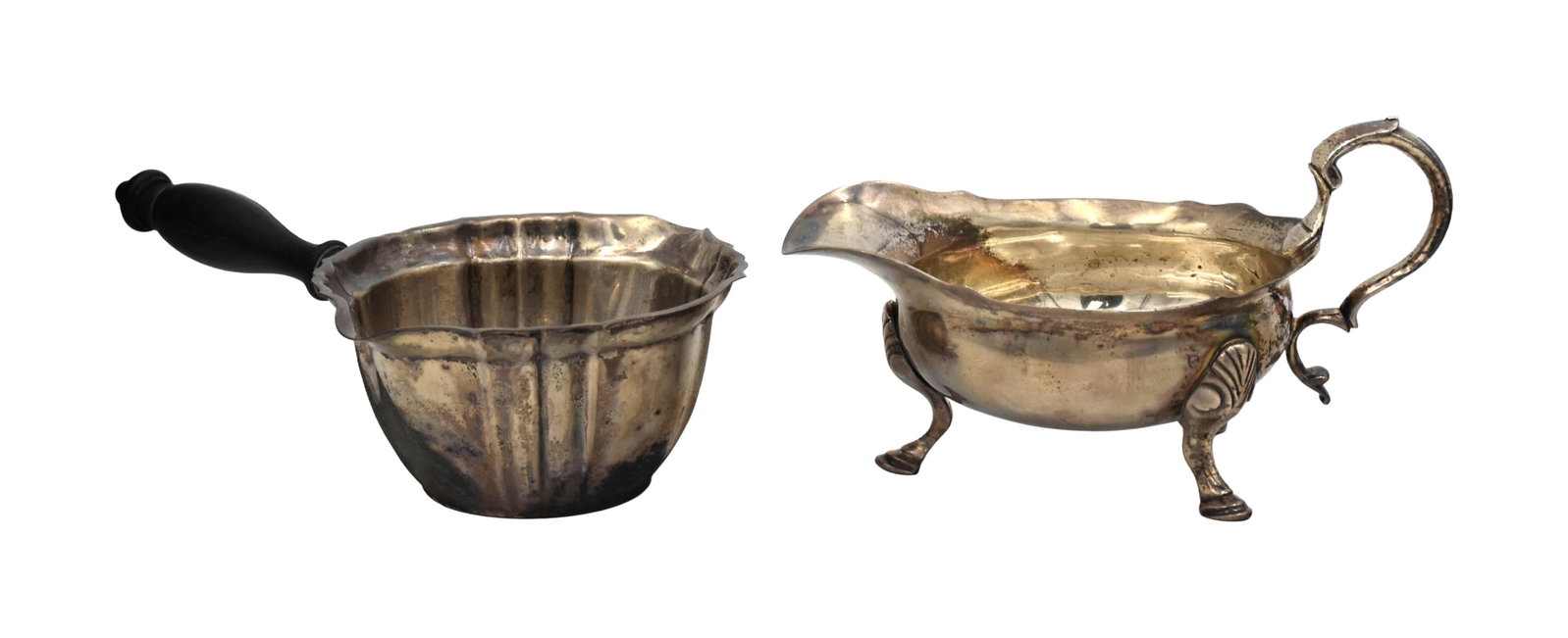 (2) Sterling Silver Gravy/Sauce Pieces: Late 19th/Early 20th C. To include: (A) Sauce pan with ebonized wooden handle and fluted body. Gorham. 2 1/2" high x 8 1/2" wide including handle x 5 1/4" deep. (B) Gravy boat on raised feet with a