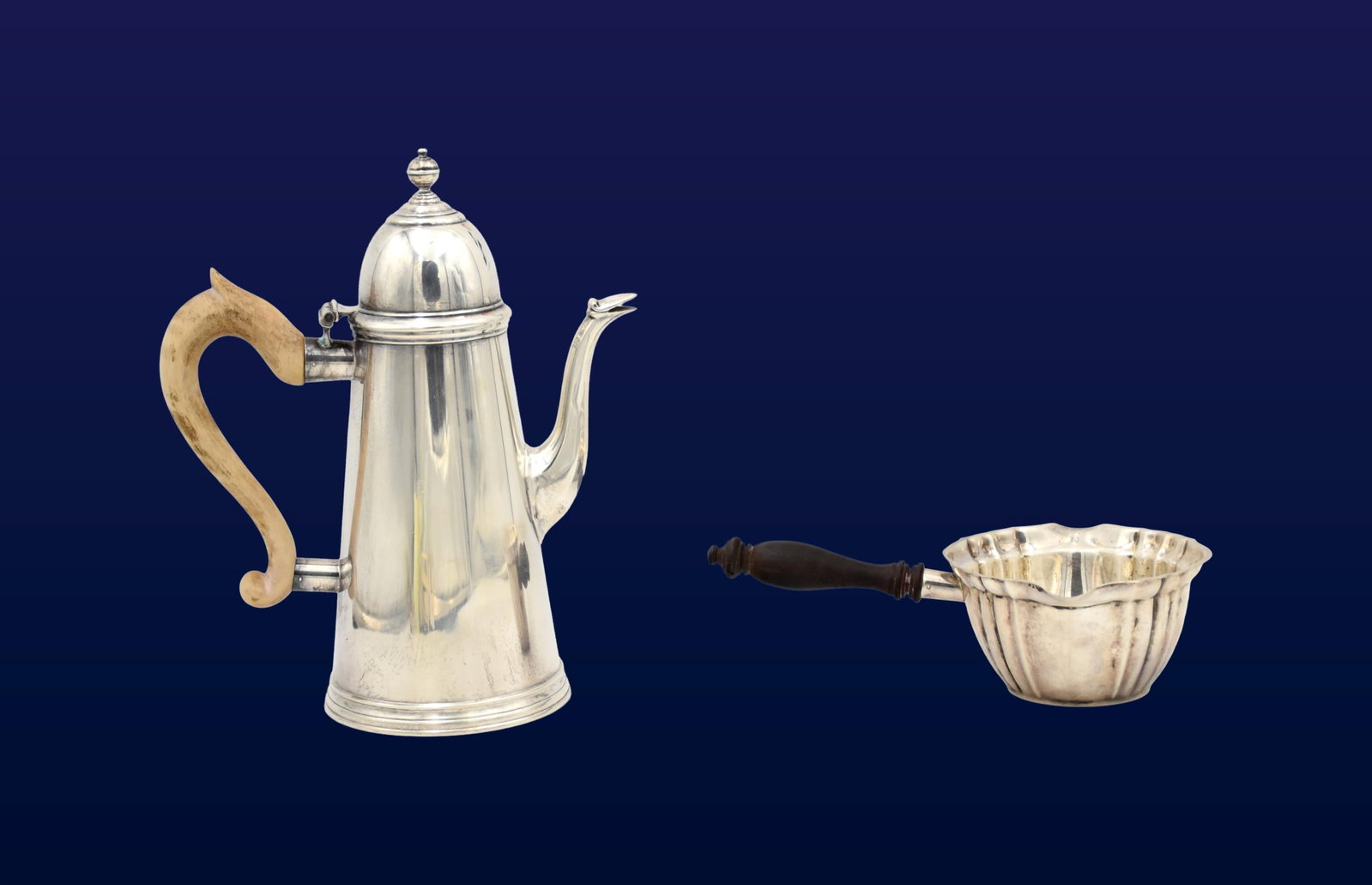 (2) Sterling Silver Table Articles: 20th C. To include: (A) Gorham sauce pan with fluted bowl and ebonized wood handle. Chippendale pattern. 2 1/2" high x 8 1/2" wide. (B) Coffee/tea pot. Domed lid with turned finial. Wood handle.