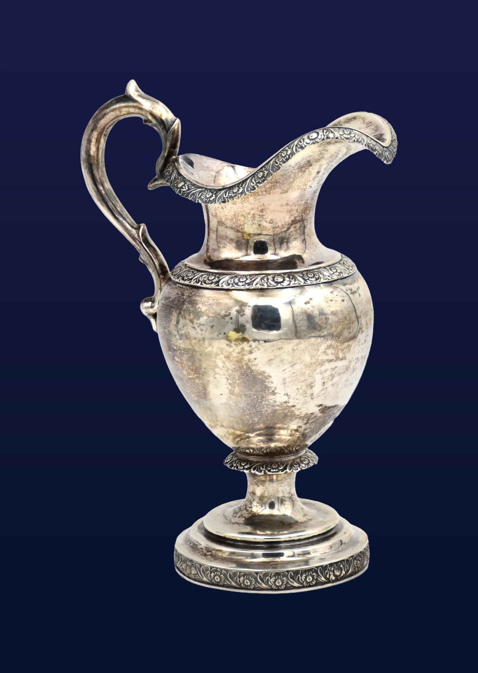Coin Silver Handled Creamer: 19th C. Signed Boston. Illegible maker. 8 3/4" high. 10.49 oztShows some dents. Worn engraving on body. IMPORTANT- Please note: all items are sold as is, where is, with all faults. Marion Antique