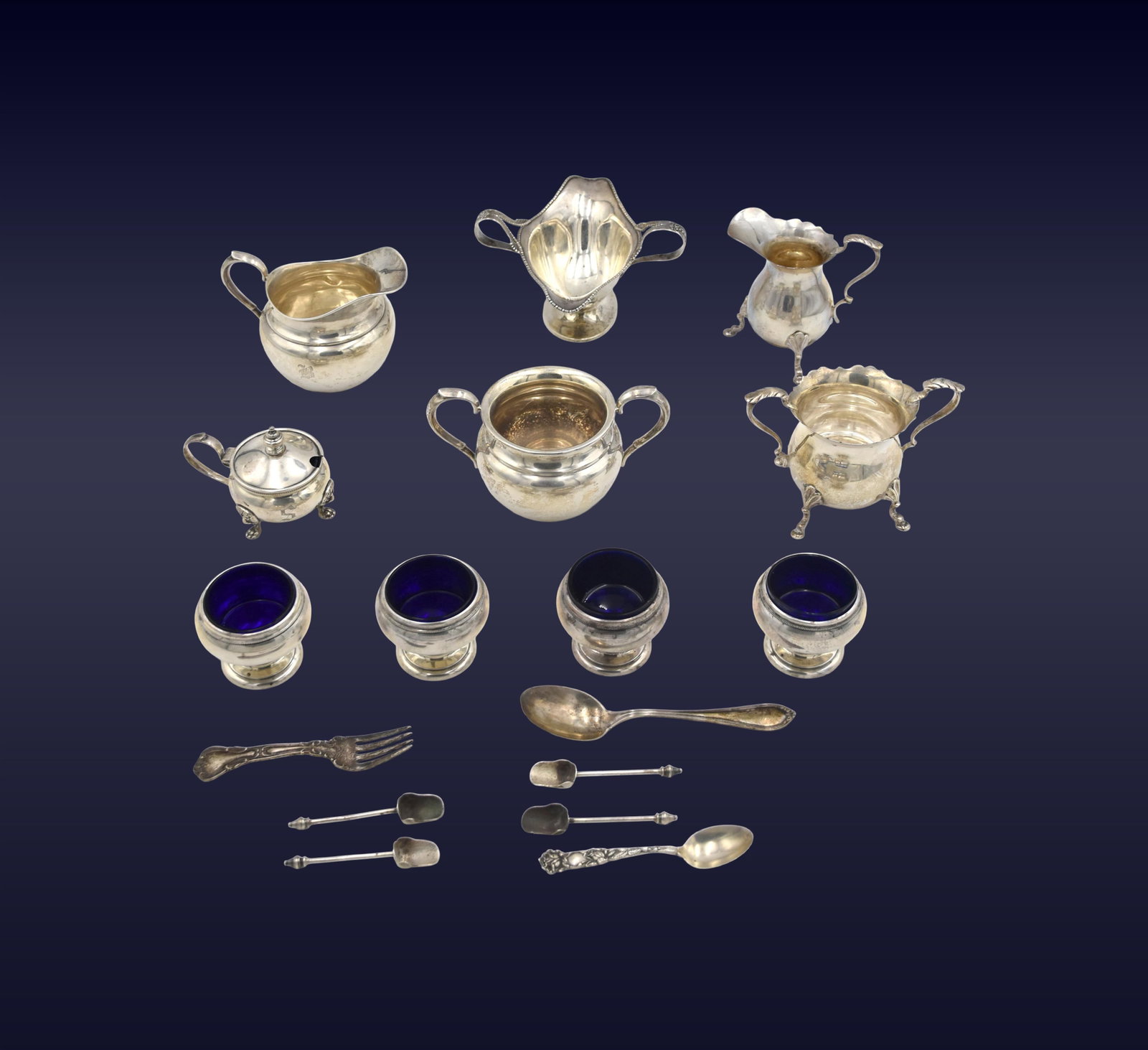 (17) Miscellaneous Sterling Items: 20th C. To include: (A) Cream and sugar. Stamped "Fisher Sterling" on bottom. 3 1/4" high. (B) Footed creamer and sugar. Stamped "BM Sterling" on bottom. Likely Blackington and Morgan. 4" high. (C)