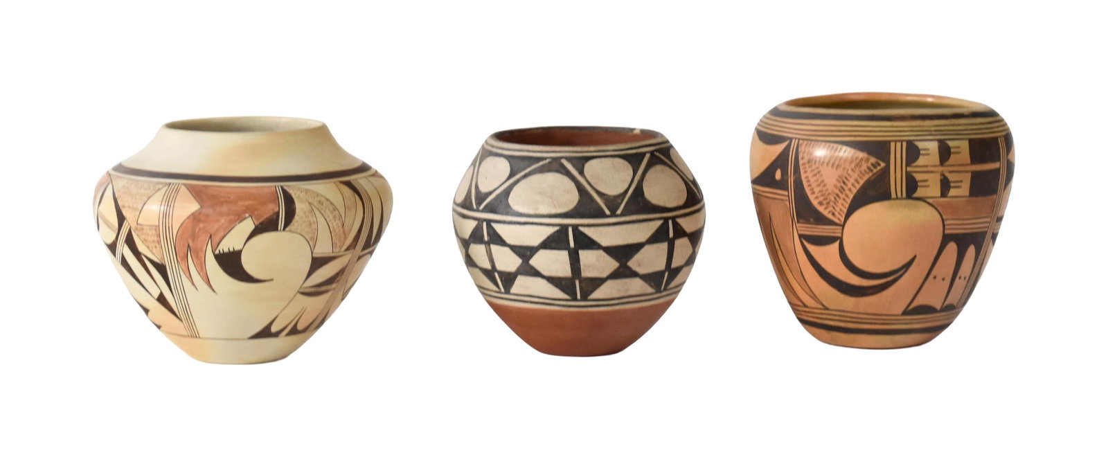 (3) Native American Pots: 20th C. To include: (A) Geometric pattern with bird. Signed "Robert Tenora, Santo Domingo, New Mexico". 7" high x 7 1/2" diameter. (B) Hopi polychrome painted pot. 7 1/2" high x 8 1/2" diameter. (C)