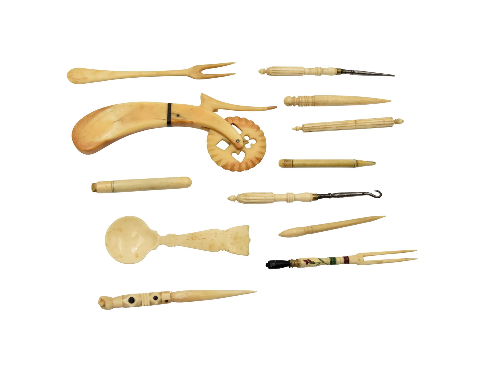 Collection of (12) Scrimshaw Tools: 19th C. To include: (A) Three bodkins. One with diamond motif inlay and clenched fist design. Two are turned. Ranging in length from: 3 1/2"- 4 1/2" long. (B) Jagging wheel with baleen accent.