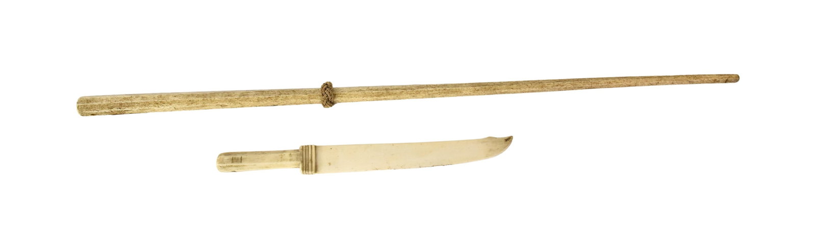 Walking Stick and Knife: Late 19th C. To include: (A) Pan bone walking stick. Rope work decoration. Eight faceted sides. 30 3/4" long. (B) Bone knife. 12 3/4" long x 1 1/4" wide. Good condition. (A) Shows a small pit toward