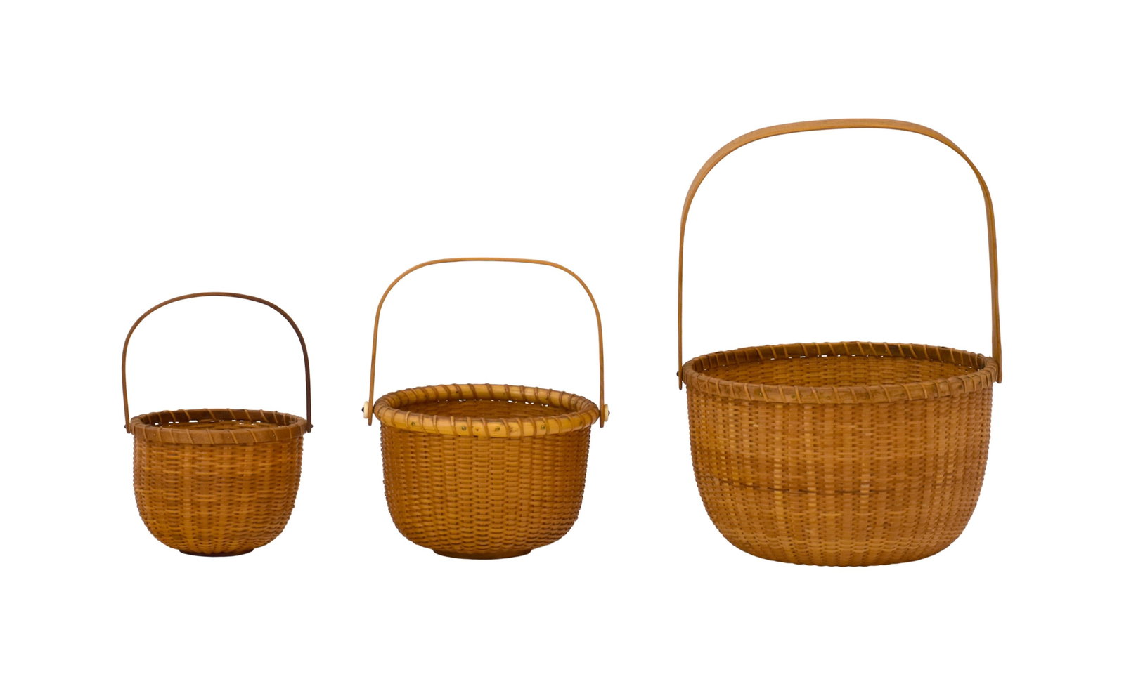 (3) Nested Nantucket Baskets: 20th/21st C. Signed "K.S. Gay". Dated 1993-2004. Largest: 8 1/4" diameter at top x 11 3/4" high with handle extended. Medium shows bone trim. 6" diameter at top x 8" high with handle extended. Small: