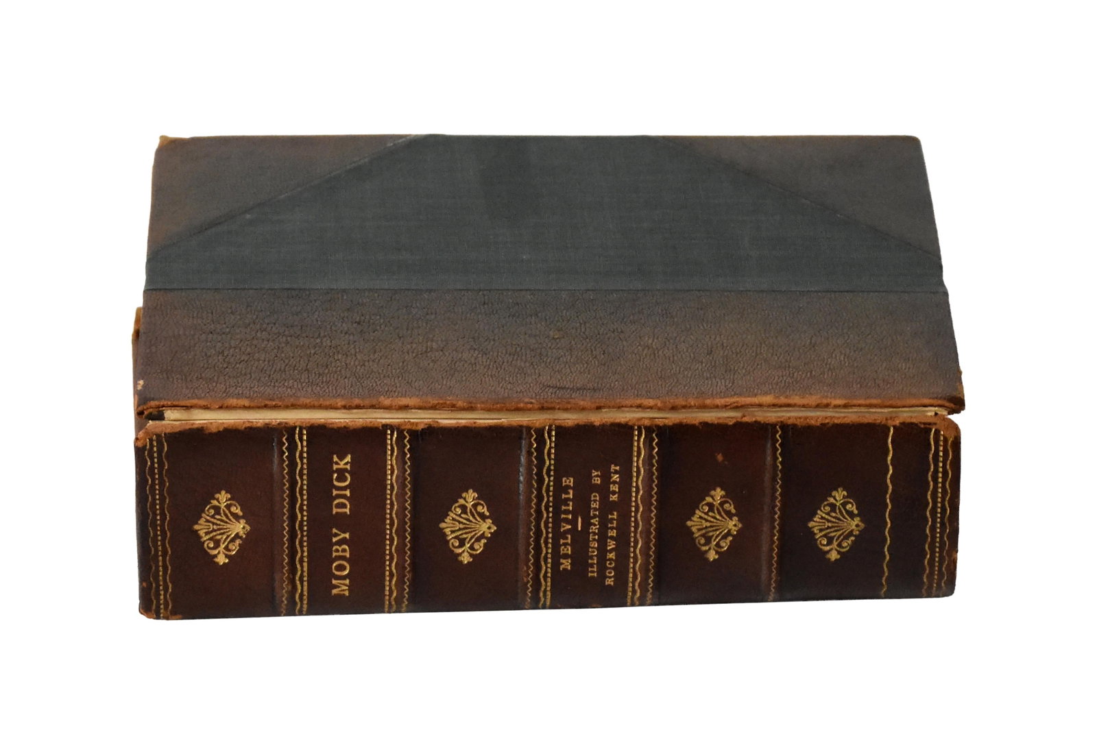 Moby Dick Book Illustrated by Rockwell Kent: Gilt edged pages. New York: Random House, 1930. 822 pages. First trade edition. Provenance: Estate of Alfred J. Walker, legendary art dealer and collector. Founder of Walker-Cunningham Fine Art.Front