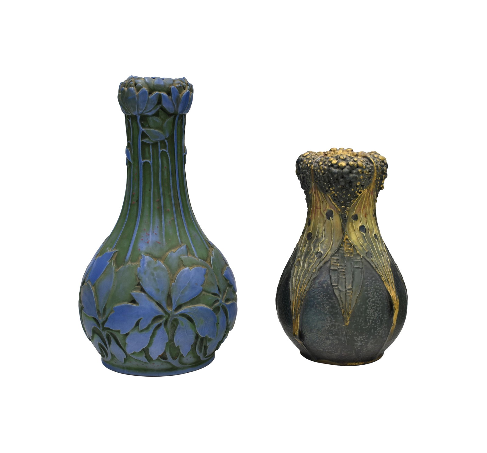 (2) Austrian Vases: Early 20th C. To include: (A) Large bottle-shaped vase with blue and green floral design. Teplitz. Raised seal mark on base. 11 1/2" high x 6 1/2" diameter at base. (B) Vase with iridescent berry and