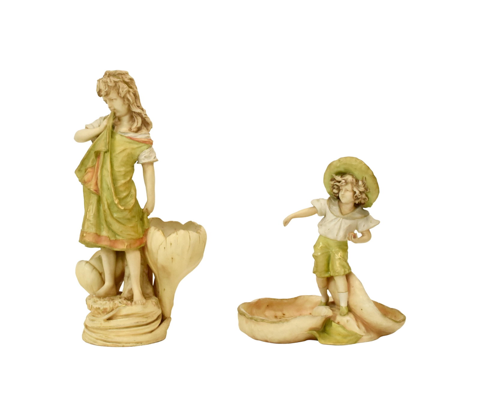 (2) Austrian Figurines: Early 20th C. To include: (A) Amphora figural vase, decorated with a figure of a young girl wearing an apron. The base is made up of two tulips that create the well of the vase. Signed with an