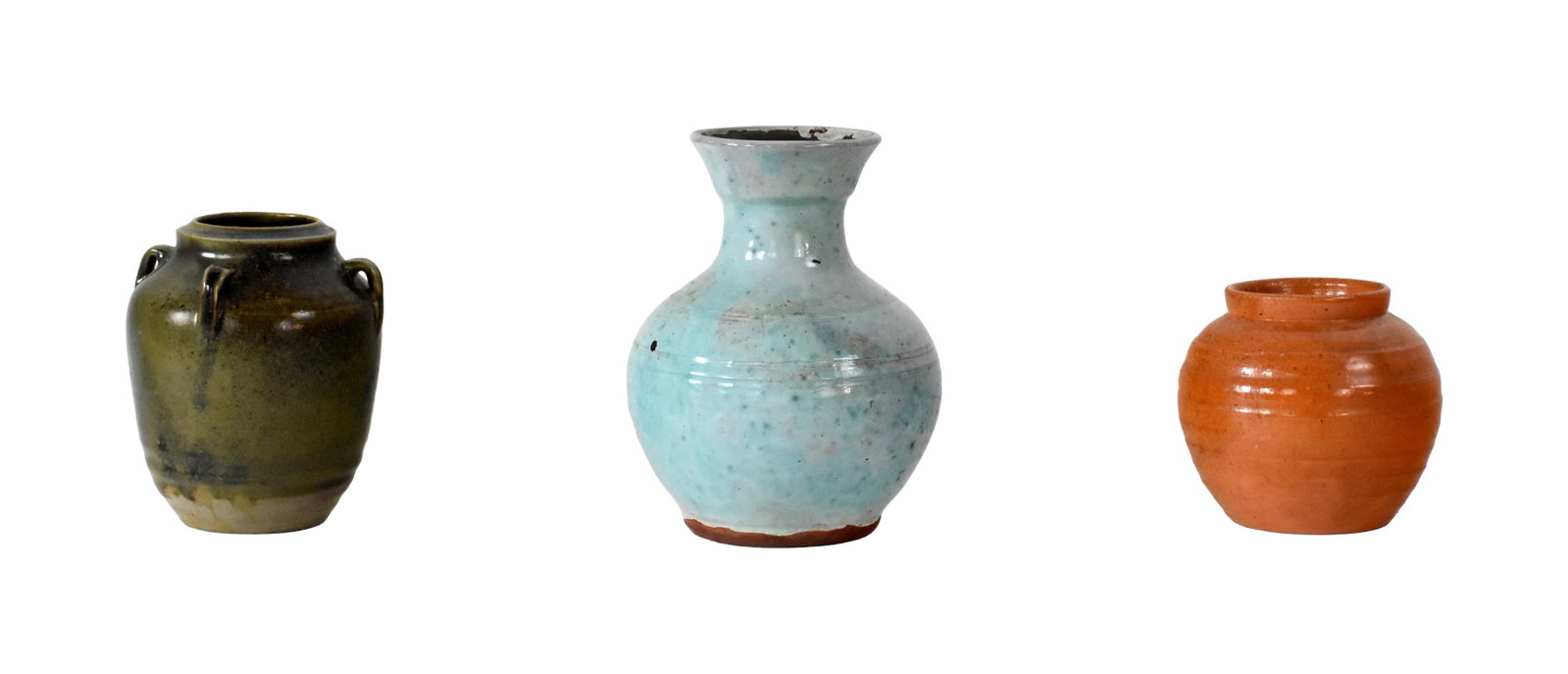 (3) Jugtown Vases: 20th C. Stamped "Jugtown Ware" on bottom. To include: (A) Orange-glazed jar with rounded shoulder and rolled rim. 5 1/2" high. (B) Olive-glazed handled vase with four small loop handles at the