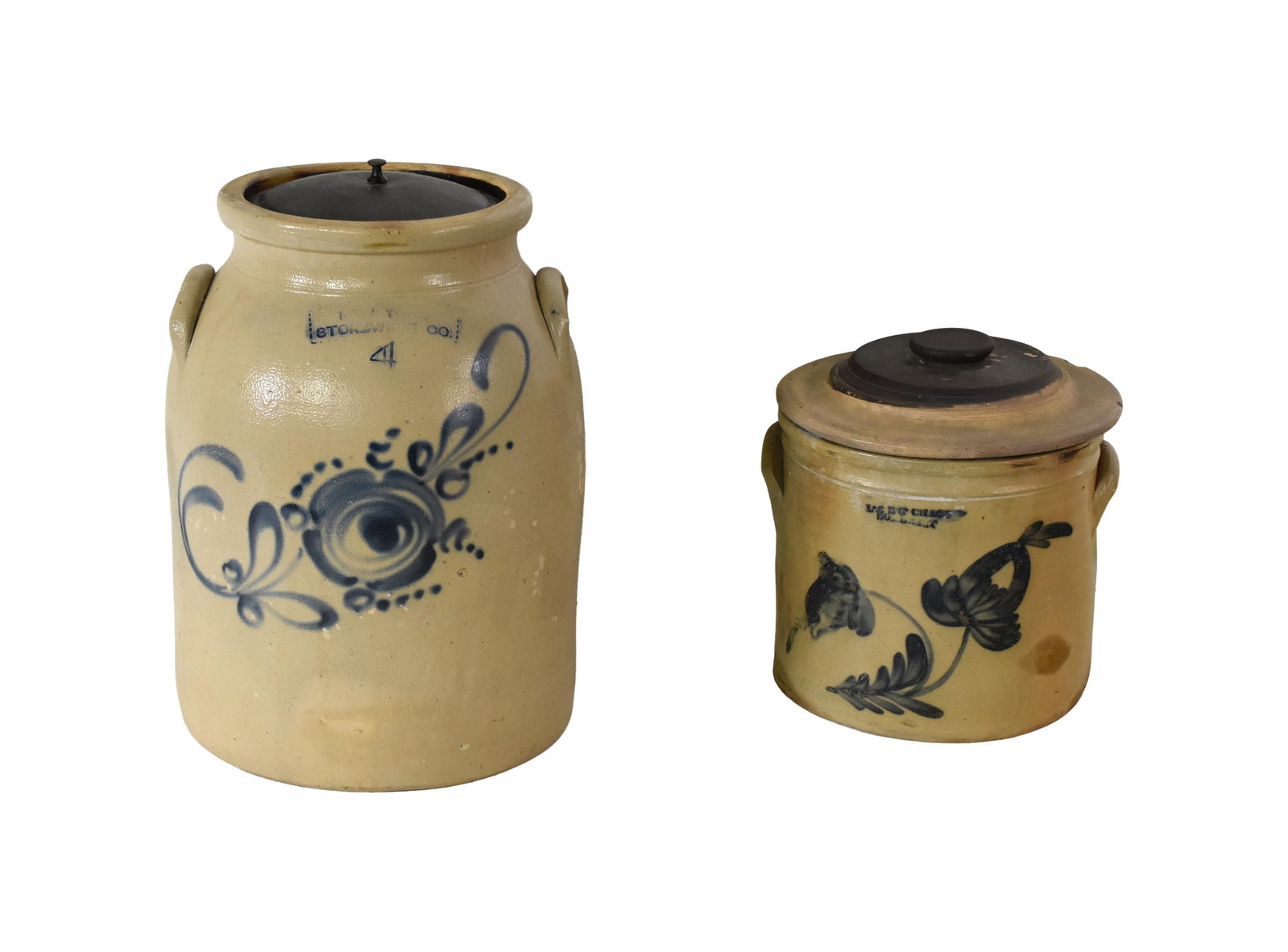 (2) Stoneware Handled Crocks: Late 19th C. To include: (A) Four gallon with metal cover. New York Stoneware Company. Floral design. 14" high x 10 1/2" diameter. (B) Probably two gallon. With cover. By LCBG Chase, Somerset. Floral