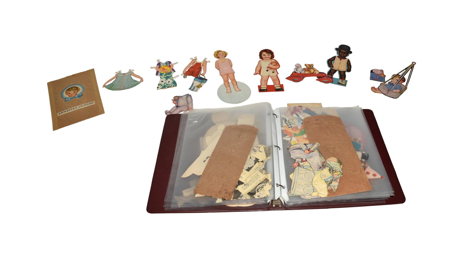 Large Lot Vintage Paper Dolls & Accessories: Large assembled collection of vintage paper dolls, clothing and accessories, comprising several hundred pieces. Includes Shirley Temple figures, Black paper dolls, babies and young children, and