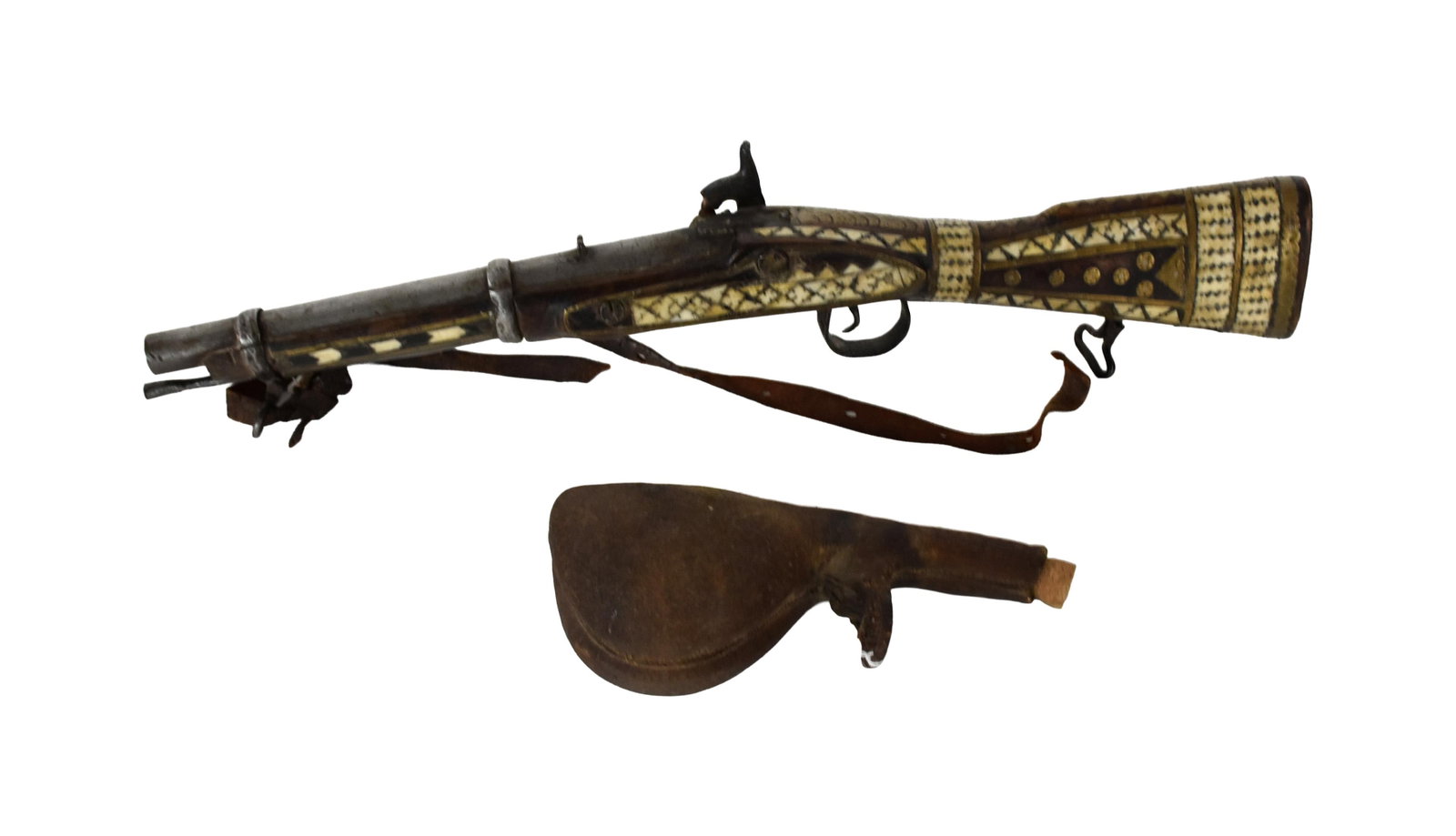 North African Percussion Musket & Powder Horn: 19th C. Possibly a pirate gun. Short musket. Brass and bone inlay. 24 1/4" long. Together with a tooled leather powder horn. 9 1/2" high x 4" wide x 3" deep.As found condition. IMPORTANT- Please