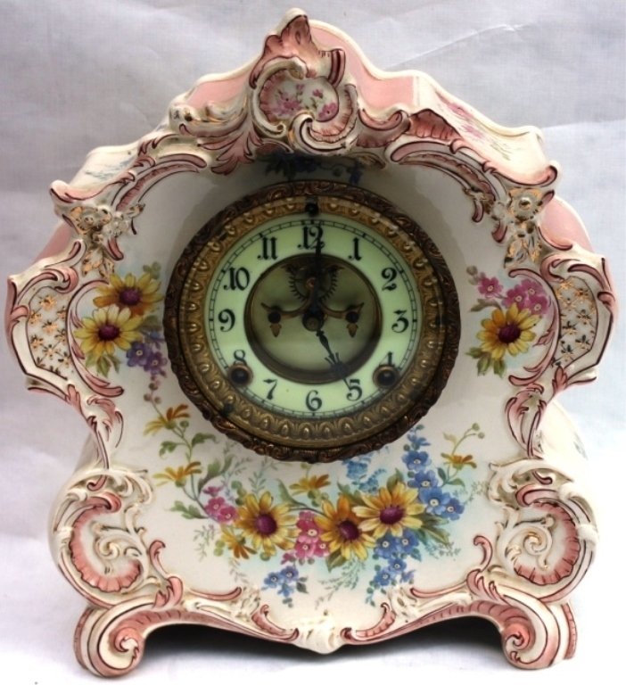 ROYAL BONN CHINA ANSONIA CLOCK, LA VOGUE MODEL,: FLORAL DESIGN, ENAMEL DIAL PENDULUM AND KEY INCLUDED, 12 3/4" HIGH, 10 3/4" WIDE, 4 1/2" DEEP.
