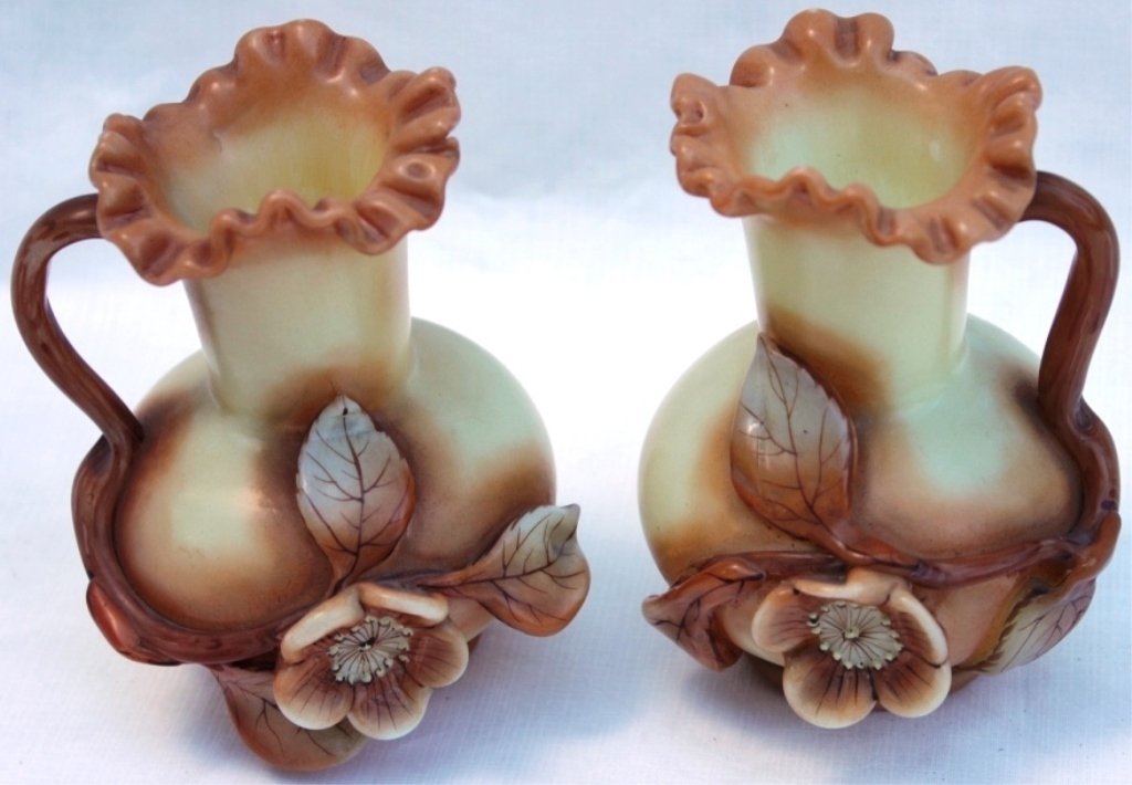 PAIR OF ENGLISH ART GLASS EWERS, RAISED FLORAL: DESIGN, CUSTARD COLOR, LATE 19TH C, 4 1/4" HIGH.