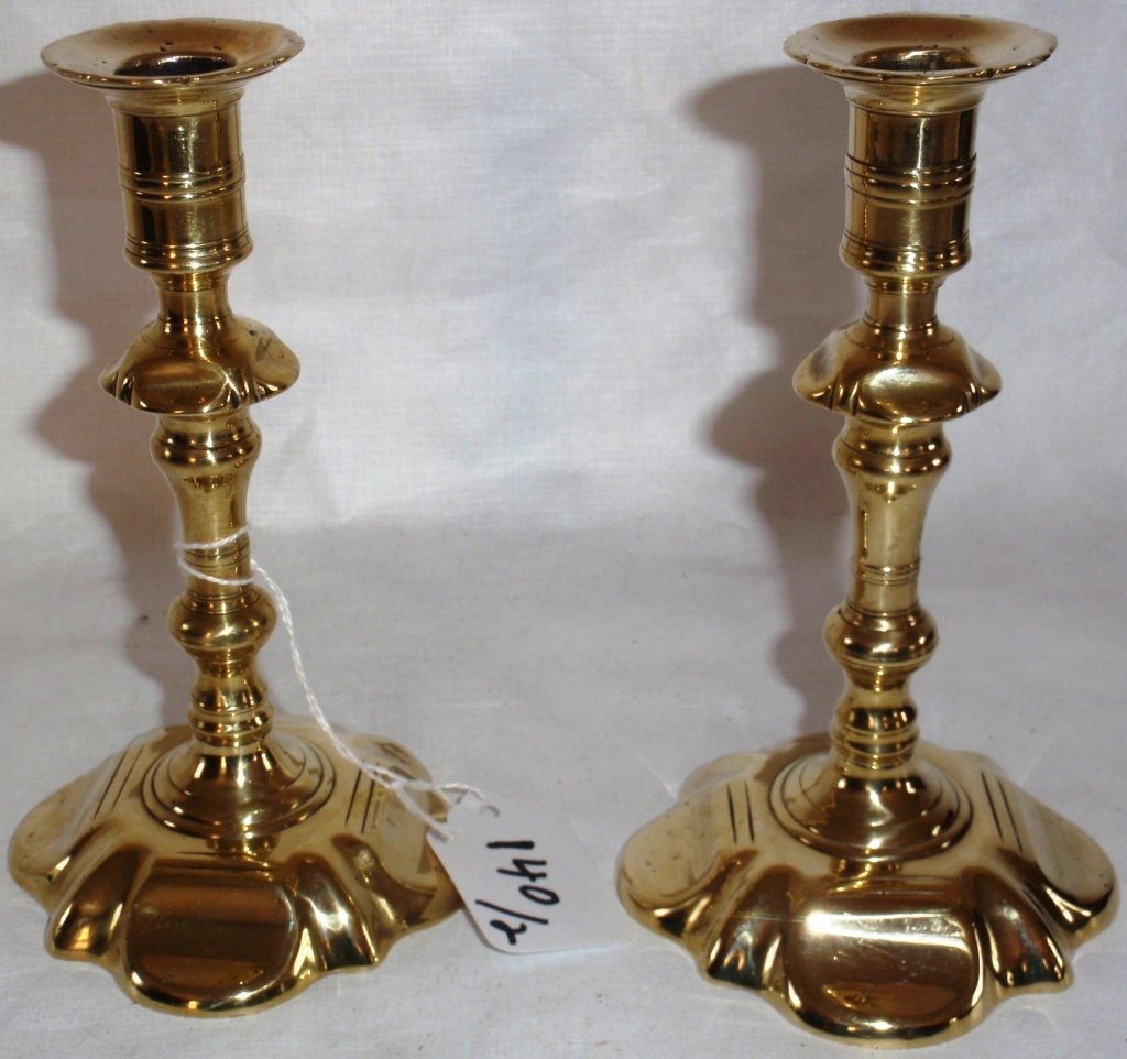 PAIR OF 18TH C QUEEN ANNE BRASS CANDLESTICKS: WITH PETAL FORM BASES, 5 3/4" HIGH, 3 1/4" DIAMETER BASE, POLISHED FINISH