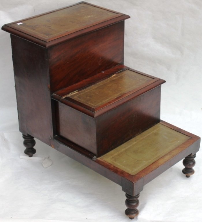 ENGLISH MAHOGANY BED STEPS, EARLY 19TH C,: WITH CONCEALED COMMODE, LEATHER TOPS, SOME VENEER LOSS, PIECE OF MOLDING MISSING.
