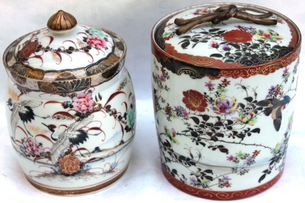 TWO JAPANESE KUTANI BISCUIT JARS WITH BIRD: AND FLORAL DESIGN, BOTH ARE 8" HIGH.