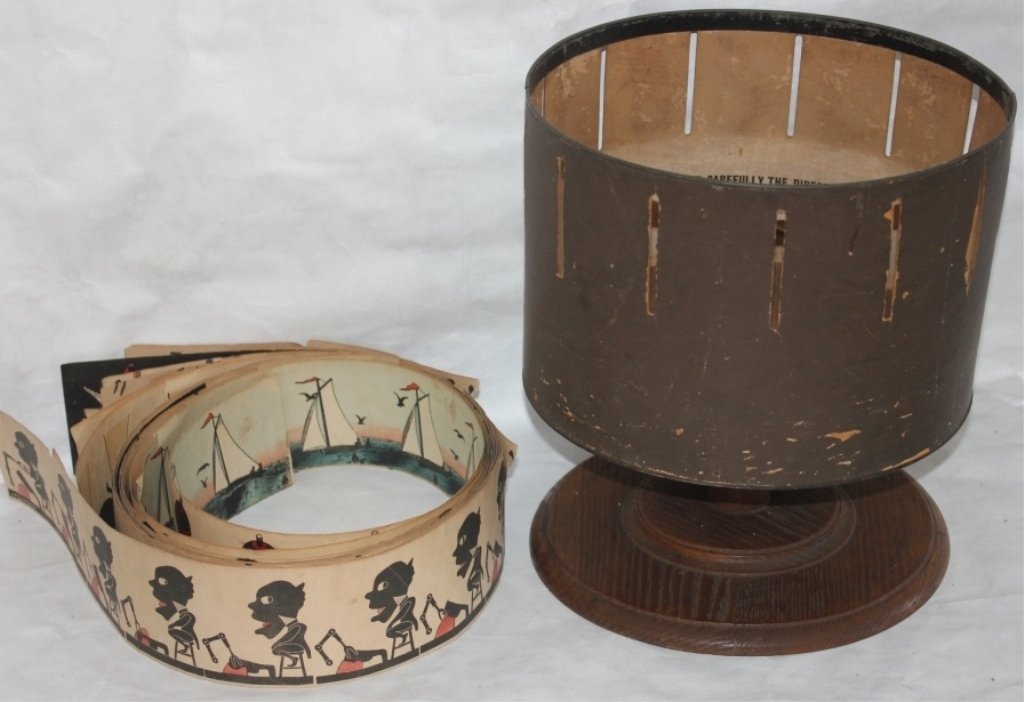 MILTON BRADLEY & CO. VICTORIAN ZOETROPE WHEEL OF: LIFE, PATENTED APRIL 23, 1867 WITH APPROXIMATELY 12 ROLLS, 13" HIGH, 11 3/4" DEEP.