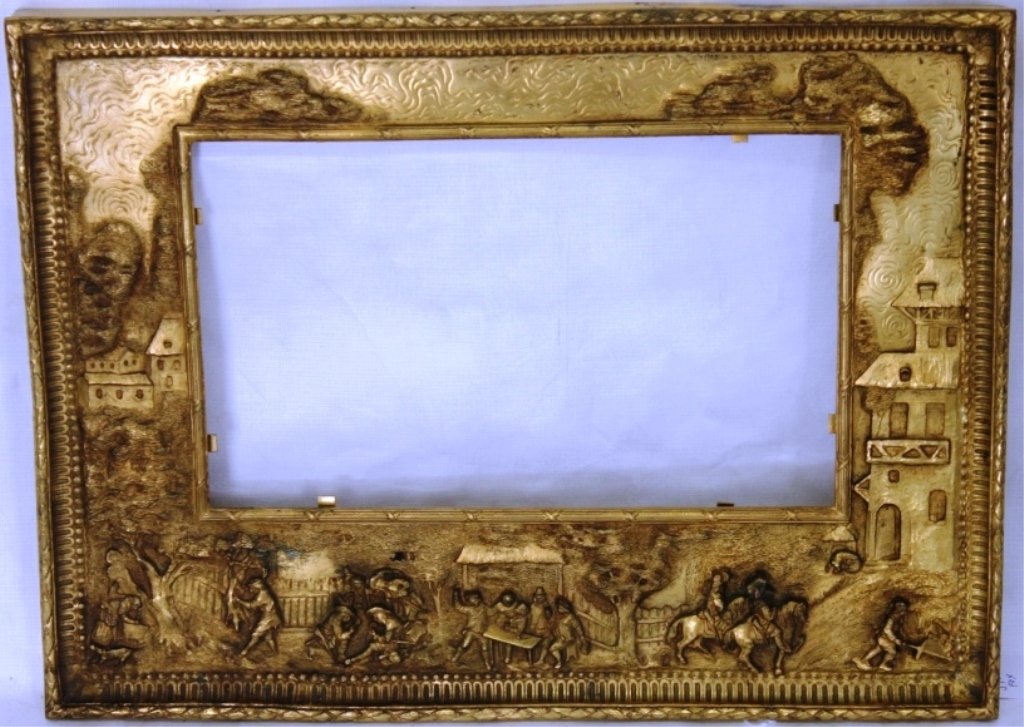 GOLD GILDED METAL FRAME, DUTCH 19TH C, RAISED: DESIGN SHOWING VILLAGE SCENE WITH SOLDIERS ON HORSEBACK, OVERALL SIZE 11" X 14 3/4", INSIDE MEASUREMENT 5 3/4" X 9 5/8."