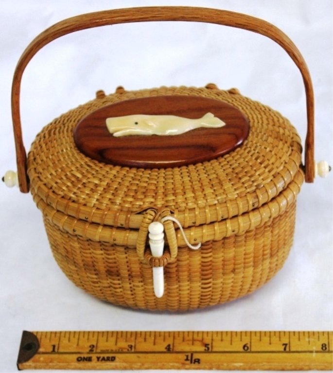 NANTUCKET LIGHTSHIP POCKETBOOK WITH SWING: HANDLE, NICE DIMINUTIVE SIZE, SIGNED ON BOTTOM C M NANTUCKET, CARVED IVORY WHALE ON TOP, 8 1/2" OVERALL HEIGHT, 8 1/2" WIDE, EXCELLENT CONDITION.