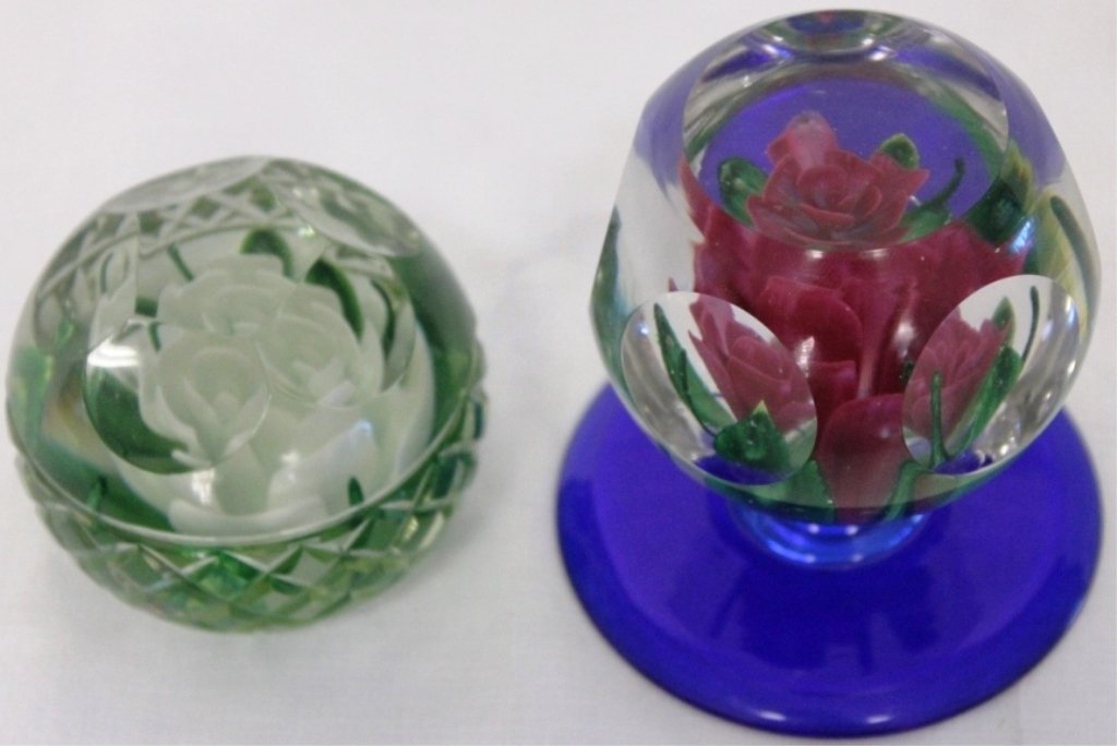 TWO SAGAMORE PAIRPOINT PAPERWEIGHTS, TO INCLUDE: PEDESTAL WEIGHT WITH FLORAL DESIGN AND FACETED SIDES, 3 1/4" DIAMETER, 3 1/4" HIGH; WHITE FLORAL CENTER WEIGHT WITH CUT AND FACETED SIDES, 2 1/4" HIGH X 2 1/2" DIAMETER.