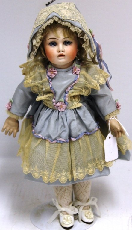 19TH C BISQUE HEAD DOLL, BLUE FIXED EYES,: PIERCED EARS, INCISED "7" ON LOWER NECK, COMPOSITION BODY, 14"