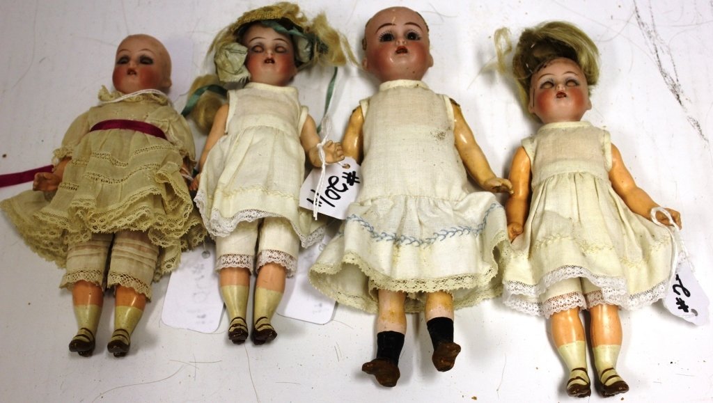 LOT OF FOUR SMALL HALBIG, K*R DOLLS,: THREE MARKED "17", ALL THREE HAVE SLEEP EYES, 6 1/2" TALL; LISA WALKER DOLL, MARKED "401", HEAD IS CRACKED, 7 1/2" TALL