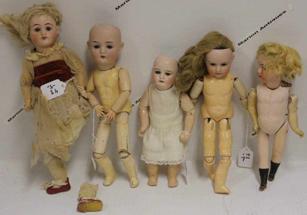 FIVE GERMAN BISQUE HEAD DOLLS, ONE LHK "4",: BLUE EYES, APPROXIMATELY 10" TALL; AN RA "21", FIVE PIECE COMPOSITION BODY, 10"; AN LG WITH ANCHOR MARK, BLUE EYES, COMPOSITION BODY, 12"; A MARIA STA (?), BROWN SLEEP EYES, OPEN MOUTH, COMPOSITION BO