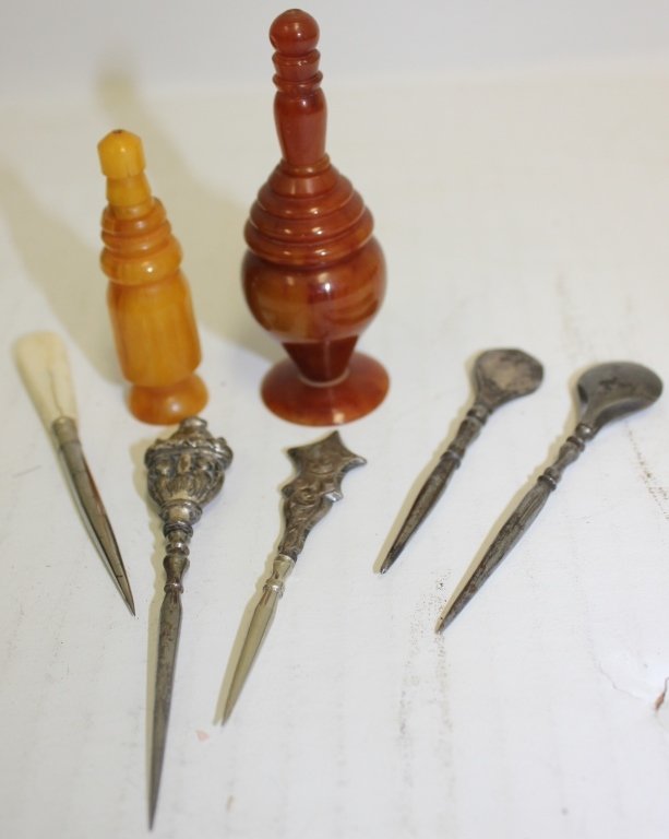 LOT 7 ANTIQUE 19TH C WICK PICKS; 2 ARE TURNED: AMBER; 4 METAL AND 1 WITH A WHALE BONE END; 3" - 3 1/4"; DAVID ARMS COLLECTION