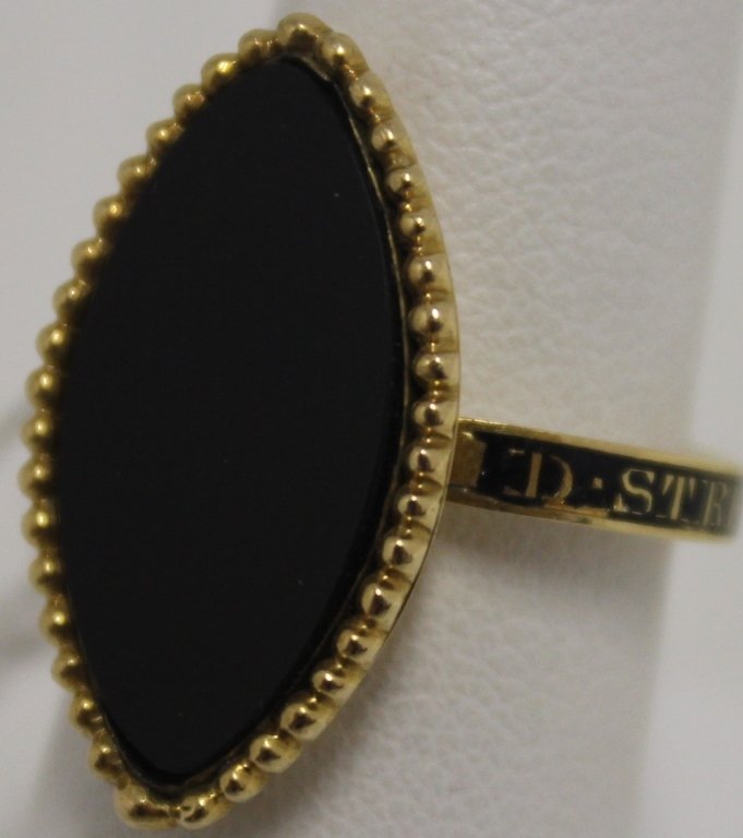 19TH C 14K (TESTED) GOLD, ENAMEL AND ONYX MOURNING: RING; "MARKED "D . STRETTON . OB 124 MAY 1784 A 62"; SOME ENAMEL LOSS; SIZE 7 OR 7 1/2; NAVETTE SHAPE TOP OF RING MEASURES 1" X 1/2"; 2.8 DWT INCLUSIVE