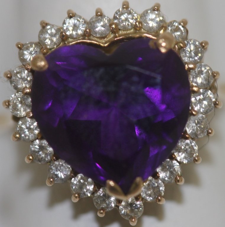 18K GOLD, AMETHYST AND DIAMOND HEART RING SET WITH: AMETHYST FRAMED BY DIAMONDS; SIZE 7 - 7 1/2; 4.0 DWT INCLUSIVE