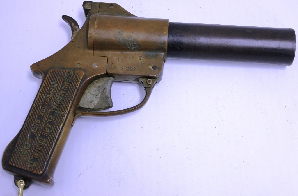 BRASS FLARE GUN BY INTERNATIONAL FLARE SIGNAL CO.,: TIPPECANOE CITY, OHIO; USN ISSUE; NO. 43; 11" LONG, 8 1/2" HIGH
