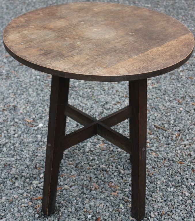 UNSIGNED L & J G STICKLEY TABLE; FUMED QUARTER: SAWN OAK WITH ORIGINAL FINISH; MORTISE AND TENON STRETCHER BASE; LIGHT STAINING ON TOP; HOYT WATSON ESTATE; 26 1/2" HIGH, 25 1/4" DIAMETER