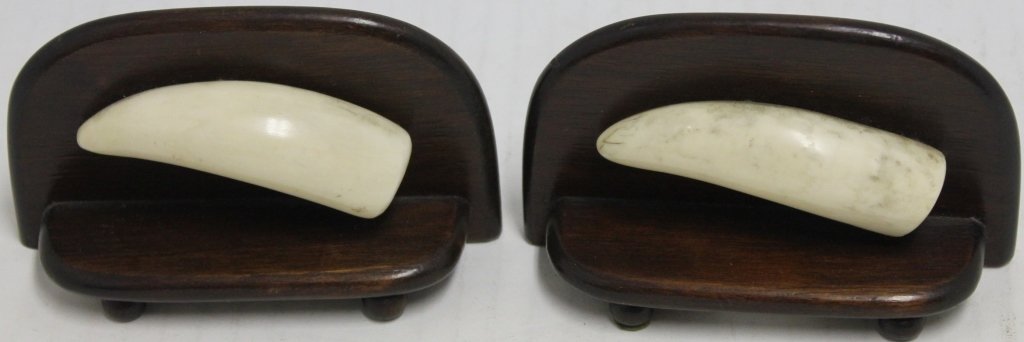PAIR OF WHALING BOOKENDS BY SHERMAN FEARING,: ROCHESTER, MA, SIGNED ON BOTTOM; MAHOGANY WITH MINIATURE WHALES' TEETH MOUNTED ON SIDES; 2 1/2" HIGH, 4 1/4" LONG; SHIPPING RESTRICTIONS, MASSACHUSETTS RESIDENTS ONLY