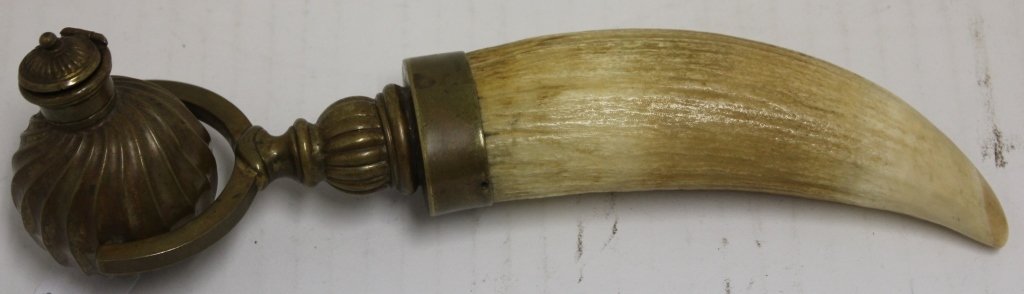 UNUSUAL ANTIQUE WHALE OIL LAMP MADE FROM A WHALE'S: TOOTH WITH BRASS FITTING AND BURNER; 19TH C; 9" OVERALL LENGTH