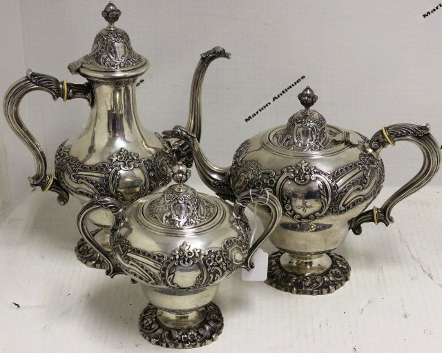 3 PC ORNATE 19TH C PORTUGUESE STERLING SILVER TEA: SET CONSISTING OF COFFEE POT, TEA POT AND SUGAR BOWL, UNUSUAL BIRD SPOUTS, MONOGRAMMED, 8" HIGH TO 13" HIGH, 104,1 TROY OZ.