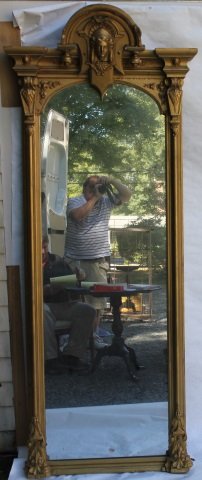 LATE 19TH C AMERICAN PIER MIRROR WITH JENNY: LIND STYLE HEAD ON CREST, PAINTED GOLD, SHOWS RESTORATION TO CORNERS, 86 3/4" HIGH, 29 1/2" WIDE.