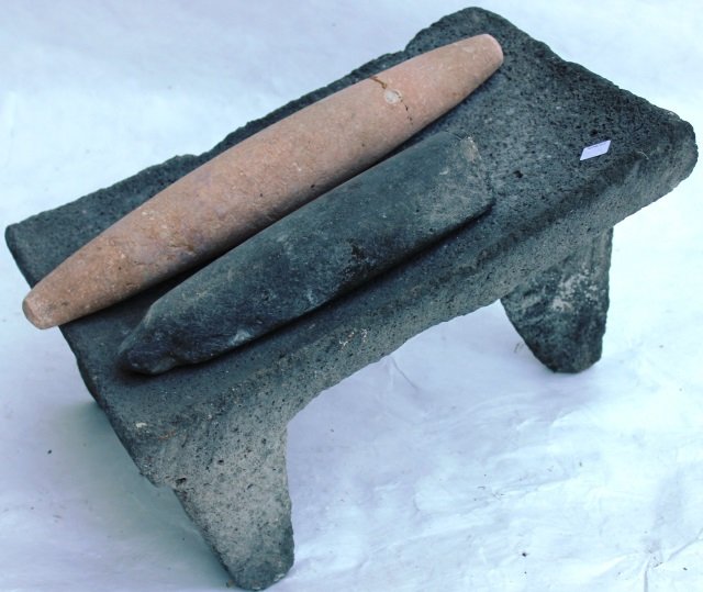 EARLY CARVED MAYAN STONE CORN GRINDER WITH: 1 POUNDING STONE AND GRINDING STONE WITH REPAIR, 12" HIGH, 18" WIDE, 13" DEEP.