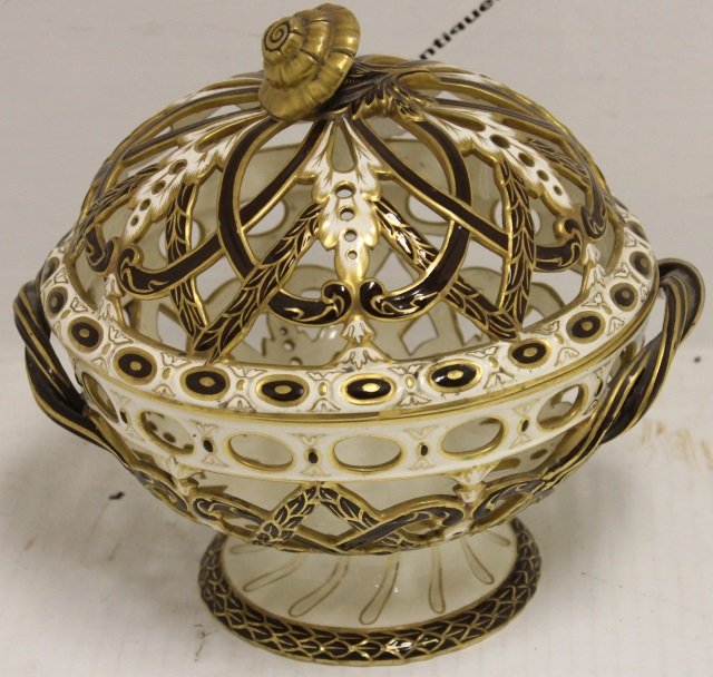 19TH C WEDGWOOD CHESTNUT BASKET ETRURIA, ENGLAND: OPEN WORK SIDES, COVER WITH FLORAL FORM FINIAL, 9" HIGH, 9 1/2" WIDE, GOOD CONDITION.