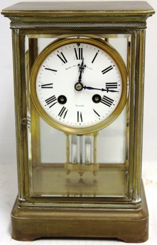LATE 19TH C CRYSTAL AND BRASS REGULATOR, FRENCH: WITH MERCURY PENDULUM, ENAMEL DIAL, RETAILED BY BIGELOW & KENNARD, BOSTON. 10" HIGH, 6" WIDE, 5" DEEP. SHIPPING RESTRICTIONS APPLY. NOT GUARANTEED TO WORK.
