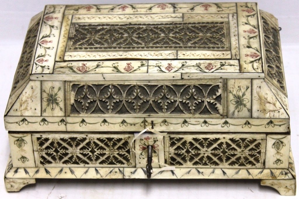 EARLY 19TH CENTURY SAILOR MADE SCRIMSHAW: POLYCHROMED JEWELRY BOX, WHALEBONE, POSSIBLY OWNED BY LYDIA CLARKSON , NEWBURYPORT, MA. HER NAME IS FAINTLY WRITTEN IN PENCIL ON THE BOTTOM. 3 7/8" HIGH, 9 1/2" WIDE, 6 1/4" DEEP.