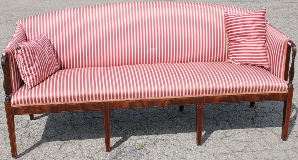 C 1920 AMERICAN FEDERAL STYLE SOFA, MAHOGANY: WITH SATINWOOD INLAY, DELICATE REEDED ARMS WITH TAPERED LEGS, MODERN STRIPED UPHOLSTERY IN GOOD CONDITION, ONE ARM SHOWS OLD REPAIR. 38" HIGH, 80" LONG, 22" DEEP.