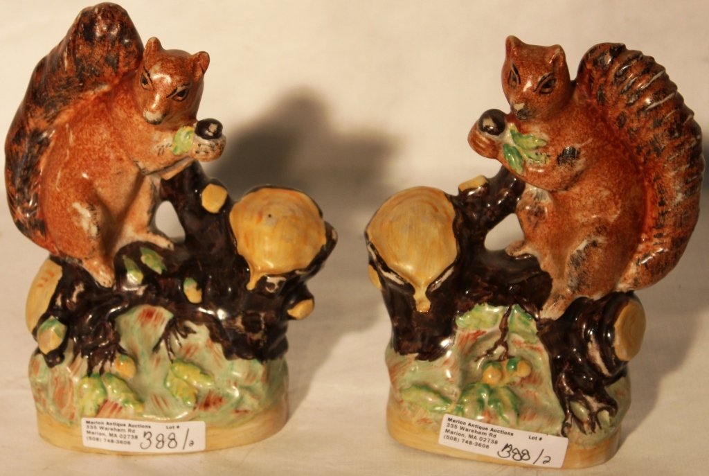 PAIR OF MID-19TH C STAFFORDSHIRE SQUIRRELS,: POLYCHROME PAINTED, 6 1/4" TALL.