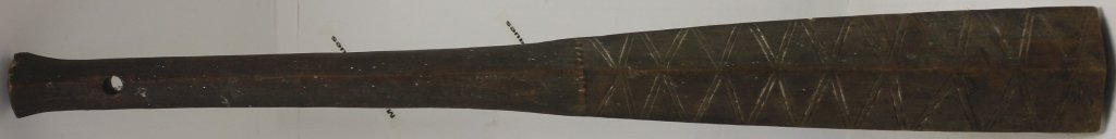 19TH C CARVED SOUTH SEA ISLAND WAR CLUB: DECORATED WITH GEOMETRIC DESIGN, ORIGINAL FINISH, 33 1/2" LONG, 4" WIDE.