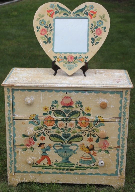 20TH C PETER HUNT SCHOOL CHEST OF DRAWERS: AND HEART SHAPED MIRROR. CHEST HAS TYPICAL HUNT DECORATION; 32" HIIGH, 35 1/2" WIDE, 16 3/4" DEEP; MIRROR IS 22" X 22".