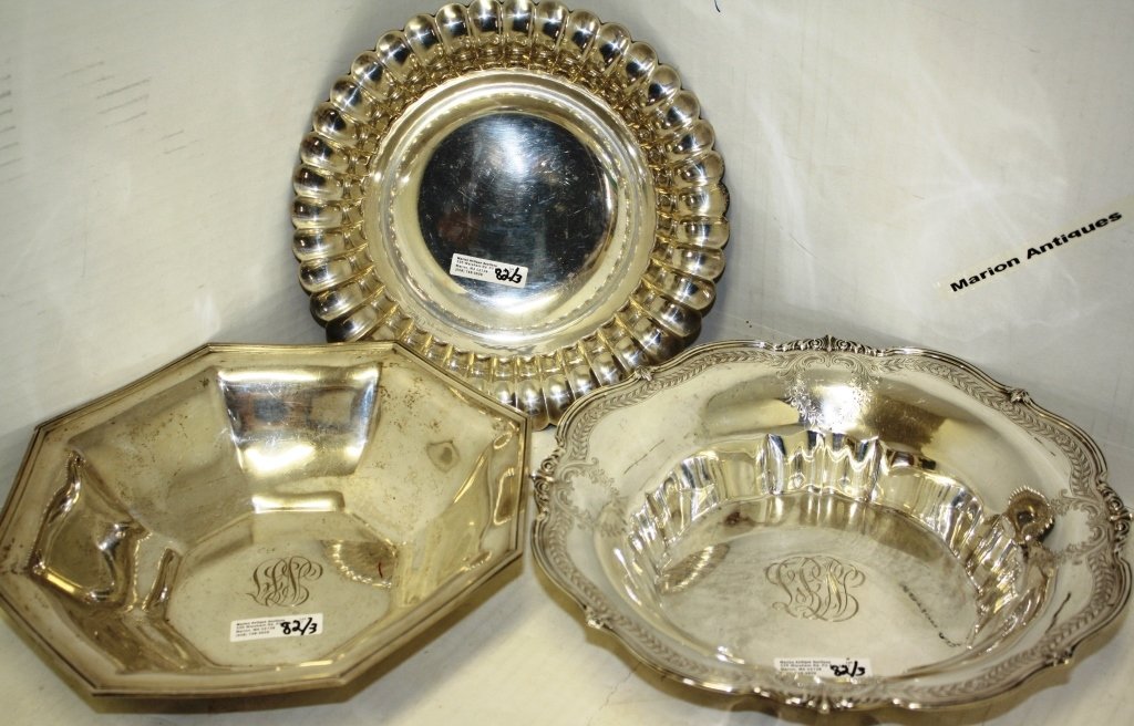 THREE STERLING SILVER BOWLS TO INCLUDE GORHAM: LEAMINGTON 9 1/2" D. ROGER WILLIAMS 10" WITH FACETED SIDES, MONOGRAMMED, BLACK STAR FROST 11 1/4" D WITH MONOGRAM, 42.1 OZT.