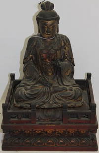 CARVED ASIAN BUDDHA, JAPANESE 18TH C, PAINTED: GILT AND LACQUERED FINISH, SOME FLAKING AND LOSS TO LACQUER, SMALL FINGER PARTIALLY MISSING, HAND UNATTACHED. ON CARVED AND PAINTED BASE, 14" H, BUDDHA 10 1/2" H, BASE 9 3/4" X 8 1/4".